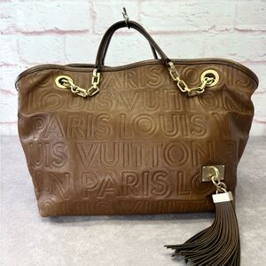 Louis Vuitton Limited Edition Whisper Souple PM Embossed Leather Bag